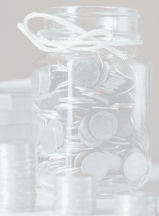 Bottles of cash with coins in saving money concept