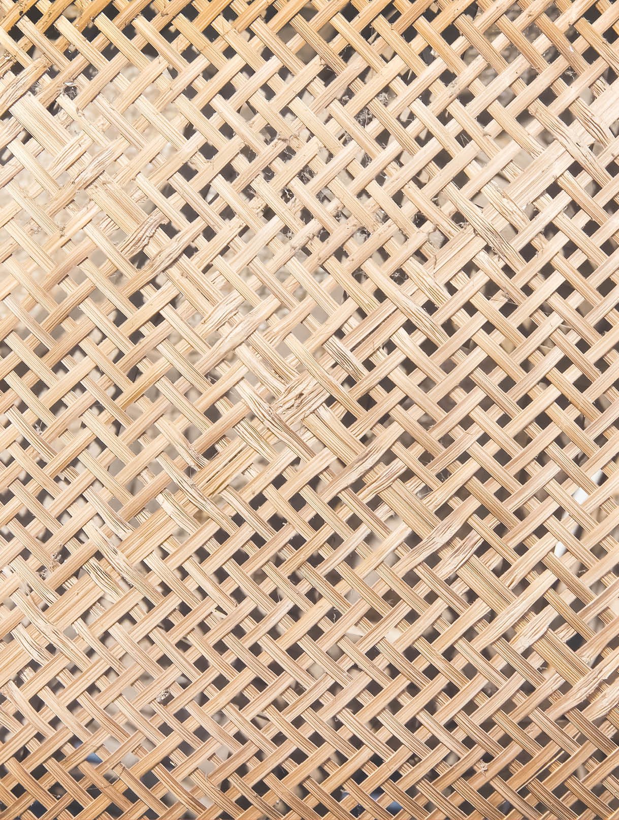 Old bamboo wood with weaving seamless texture intelace patterns abstract hamper background 