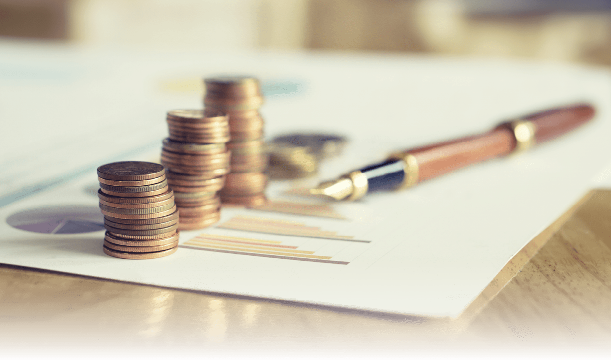 Saving stack coins money concept,graph,chart document and pen on desktop desk in hipster office,copy space.selective focus,vintage color